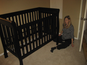 Amanda hard at work on crib assembly