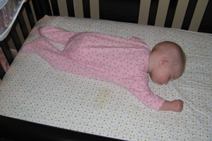 Adria sprawled out on her belly