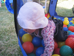 Running up against the mesh wall of the pit