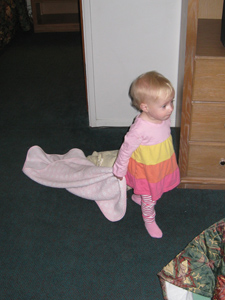 Adria trailing her blanket around by the corner Adria trailing her blanket around by the corner