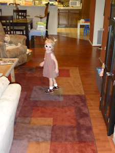 Adria in her shades, looking back at the camera Adria in her shades, looking back at the camera