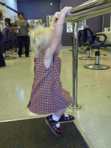 Adria swinging on the handrails