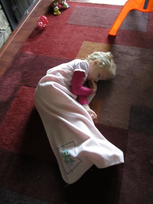 Adria laid down on the floor and fell asleep there