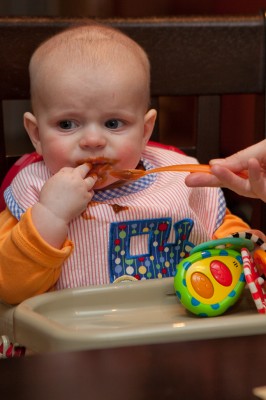 Austin contemplating the first bite of the sweet stuff