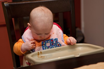 Austin trying to lick his bib