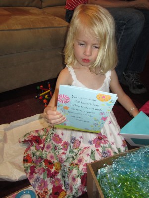 Adria opening her Easter basket from Gamma and GranD