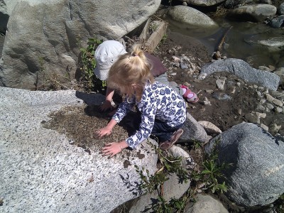 Adria and Helen "polishing" a big flat rock