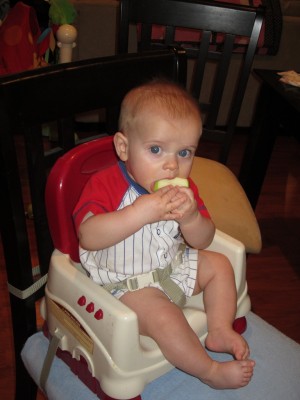 Austin munching an apple slice